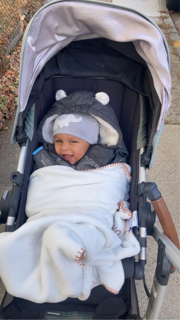 Happy baby in stroller 