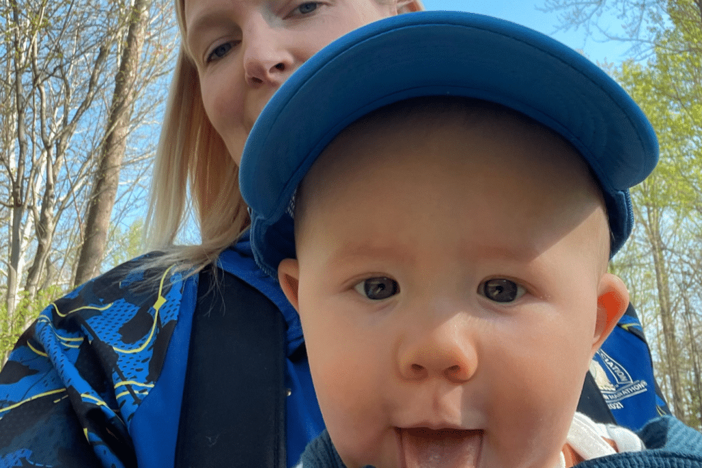 mom and baby enjoying walk in the park