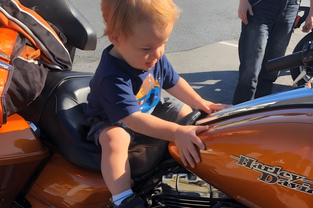Bikers for babies group allows tiny milk donor to sit on bike